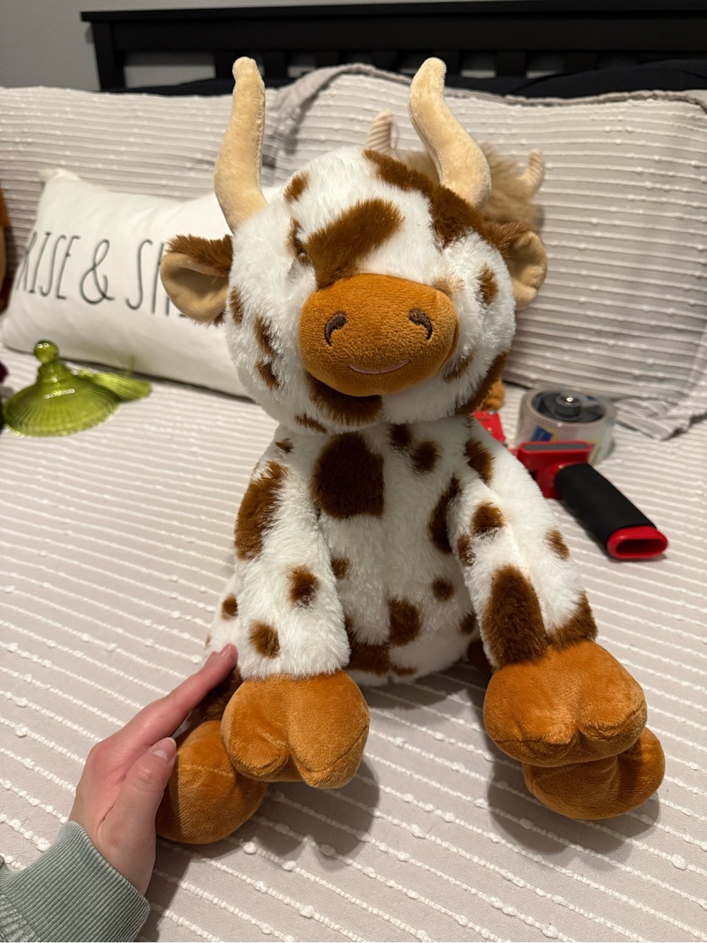 Spotted longhorn cow warming plushie